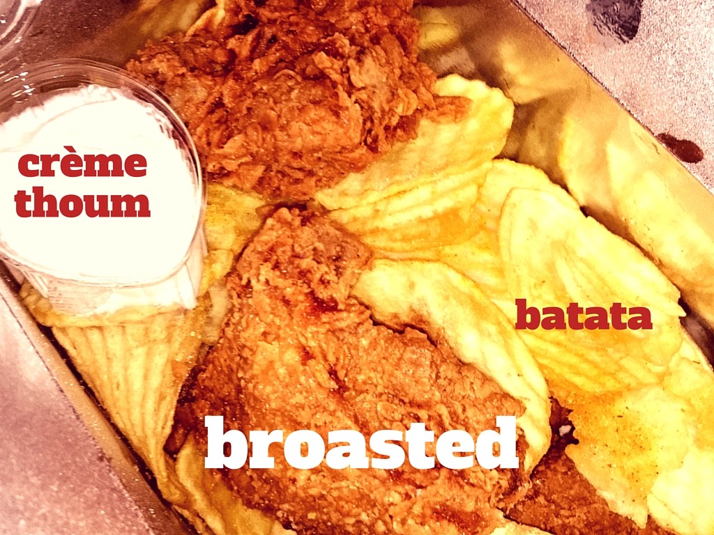 Broasted (fried chicken) with potato fries and garlic cream