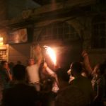 Fireworks and celebration in the street at night