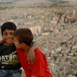 Two Kurdish boys on top of Mount Qasyun