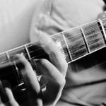 Close up of guitar playing