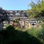 Ruin of building of black and white stone